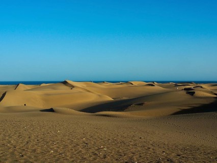 Fascinating dunes under a clear blue sky, Maspalomas Dunes, Gran Canaria, Spain