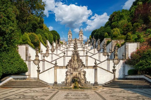 Wide landscape view of Bom Jesus do Monte in Braga, Portugal, showing the monumental staircase,
