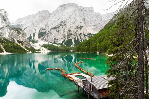 Summer vibrant landscape viewpoint s Lago di Braies Lake in italian Dolomites mountains in northern