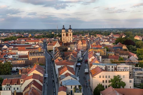 City view with city church in the evening, Luther city Wittenberg, Saxony-Anhalt, Germany