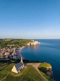 Aerial view of the Notre Dame de la Garde chapel after sunrise at the Falaise d'Amont viewpoint, on