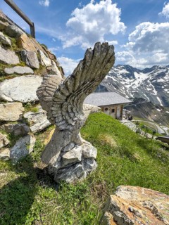 Stone-carved sculpture of eagle on Edelweissspitze next to Edelweisshütte, Fusch, Province of