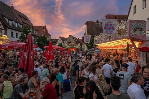 Visitor and candy stand at the Laufer City Festival, evening sky, Lauf an der Pegnitz, Middle