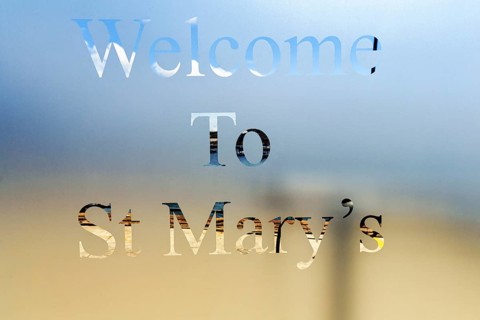 Welcome. Inscription on glass panel, Hugh Town, St Mary's, Isles of Scilly, Cornwall, England,