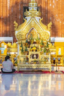 Altar for offerings to Buddha, Dharma and Sangha, in front of the chedi at Wat Phra That Phanom,