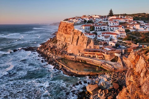 Breathtaking view of Azenhas do Mar, a charming seaside village perched on cliffs by the Atlantic