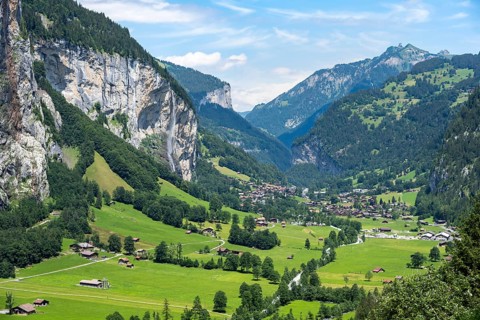 View of the picturesque valley of Lauterbrunnen with Staubbach Falls, mountain landscape, Bernese