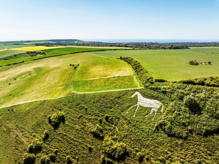 Litlington White Horse over Cuckmere Valley from a drone, Hindover Hill, South Downs, East Sussex,