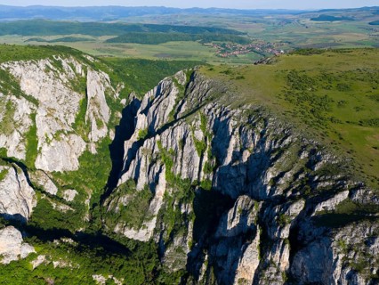 Aerial view of impressive rock formations and vast valleys under a clear sky, aerial view, Cheile