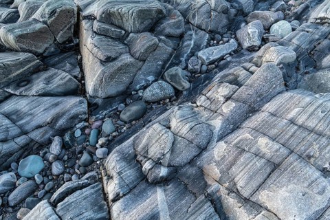 Rock structures on the coast, Söröya, Finnmark, Norway, February 2019