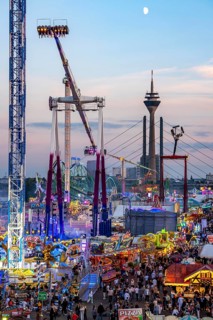 Rhine fair in the Rheinwiesen in Düsseldorf-Oberkassel, view towards the Rhine Tower,
