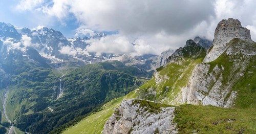 View of mountain landscape with peaks of the Tschingelgrat and Breithorn, clouds moving over