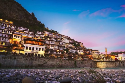 Illuminated Berat Mangalem district timelapse sunset Albania. UNESCO World Heritage site and City