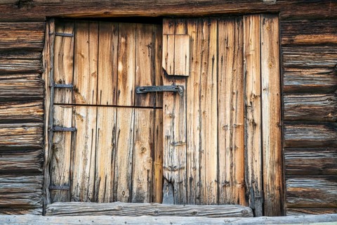 Barn door on a traditional farm, Alvdal, Hedmark, Innlandet, Norway, June 2026