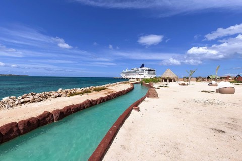 Cruise ship docked at Cabo Rojo port, Puerto Plata, Dominican Republic, featuring a winding