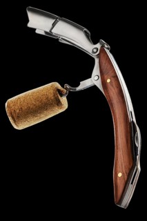 Premium corkscrew with metal spiral with wine cork and wooden grip. Wine opener with wooden handle