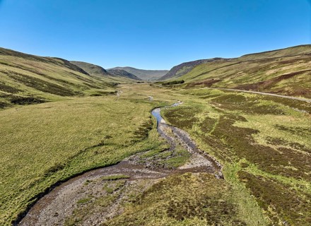 Aerial drone view of the highland landscape in the Cairn Gorm National Park, Scotland, UK