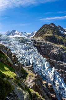 Picturesque high-alpine mountain landscape with Lower Eismeer glacier, hike to Schreckhornhütte,