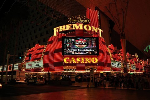 Neon-lit Fremont casino at night dominated by red lights, Las Vegas, Nevada, USA