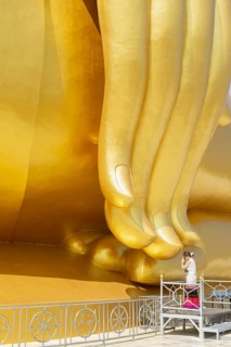 Largest Buddha statue in Thailand (Luang Pho Yai), Thai woman, Wai gesture (traditional gesture of