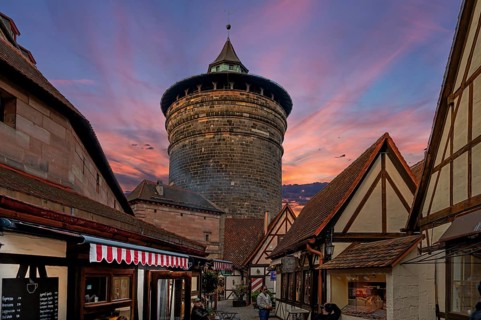 Handwerkerhof and historic Frauenturm with evening sky, Nuremberg, Middle Franconia, Bavaria,