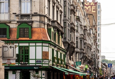 Bustling shopping street in downtown Liège, Belgium, digitally reworked