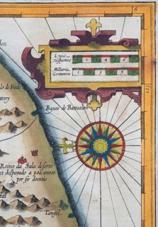 Old coloured map of Ceylon or Sri Lanka decorated with compass rose and decorative cartouche, by