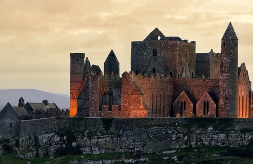 The illuminated Irish Rock of Cashel Castle in Ireland