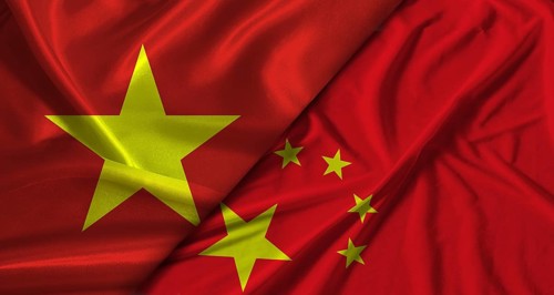 Bilateral relations between Vietnam and China. Flag of Vietnam and China