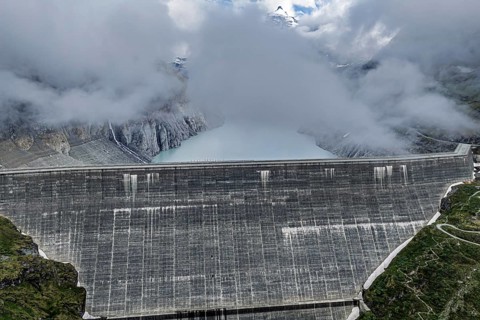 Grande Dixence dam, tallest concrete gravity dam in the world, lake Lac des Dix, aerial view,