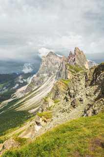 Dramatic Seceda mountain peaks scenic view Dolomites Alps Italy summer daytime green alpine meadow