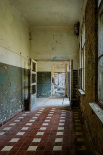 Long dilapidated corridor in the former lung sanatorium and lost place health resort Grabowsee,