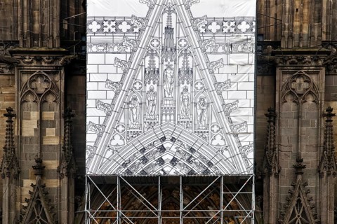 Scaffolding with black and white depiction of the restoration work on the north façade, Cologne,