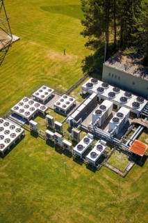 Arrangement of air-conditioning units in a meadow next to a building, Bunker Anlage, Calw, Germany