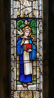 Stained glass east window depicting Saint Columba Abbot, Debenham church, Suffolk, England, UK c