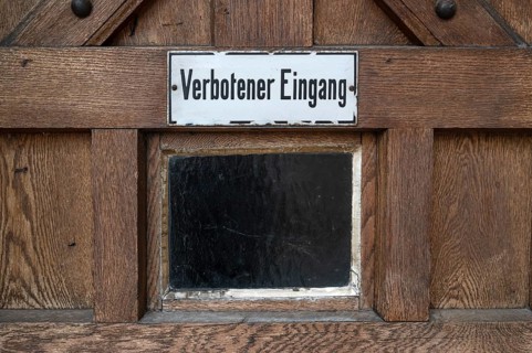 Prohibition sign on a door of an old company, Lauf an der Pegbitz, Middle Franconia, Bavaria,