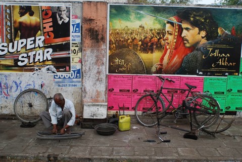 Cycle repair in a street, Ahmedabad, Gujarat, India