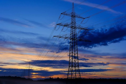 Power traverse at sunrise power pole