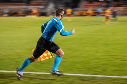 Assistant of football referee during the match in Glogow, Poland
