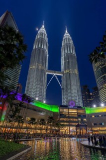 Petronas Towers, KLCC Twin Towers, interlinked 88-storey supertall twin skyscrapers illuminated at