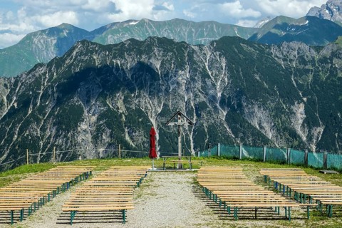 Seating and cruez for mountain service at Schlappoldsee station of the Fellhorn cable car, in the