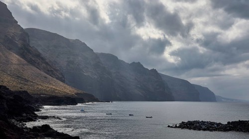 Punta de Teno, gloomy coastal landscape with dramatic clouds over the sea and rocks, Masca,