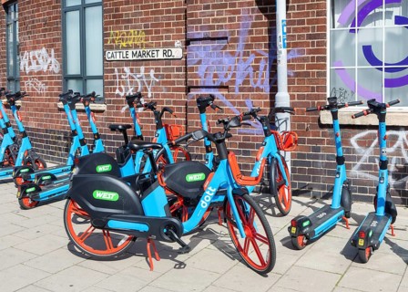 Public rental electric vehicles WEST e-bikes and e-scooters operated by micromobility company Dott,