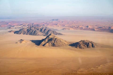 Aerial view, sand dunes and mountains of the Namib Desert, Namib Naukluft Park, Namibia