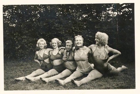 Bathing, swimwear, leisure, summer, woman, smiling woman in bathing suits perform gymnastic