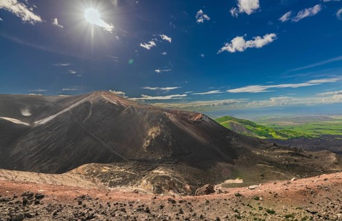 Viewpoint of the Cerro Negro volcano surrounded by vegetation. Scenic view of Cerro Negro,