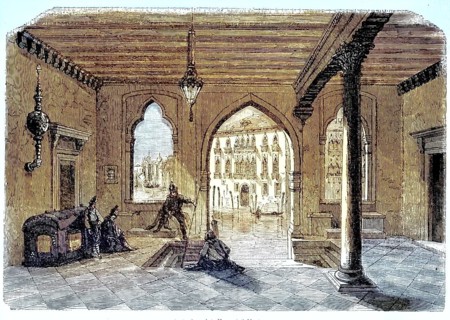 Atrium of Palazzo Foscari in Venice with Gothic architectural elements and figures in the