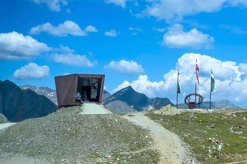 Pass of Alpine Pass Timmelsjoch Timmelsjoch-Hochalpenstraße with left concrete sculpture