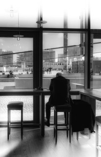 Black and white photograph, guest in a Berlin cafe near the main train station, Berlin, Germany