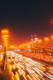 Panorama Dubai heavy night night traffic on Sheikh Zayed Road after work rush hour traffic. Light